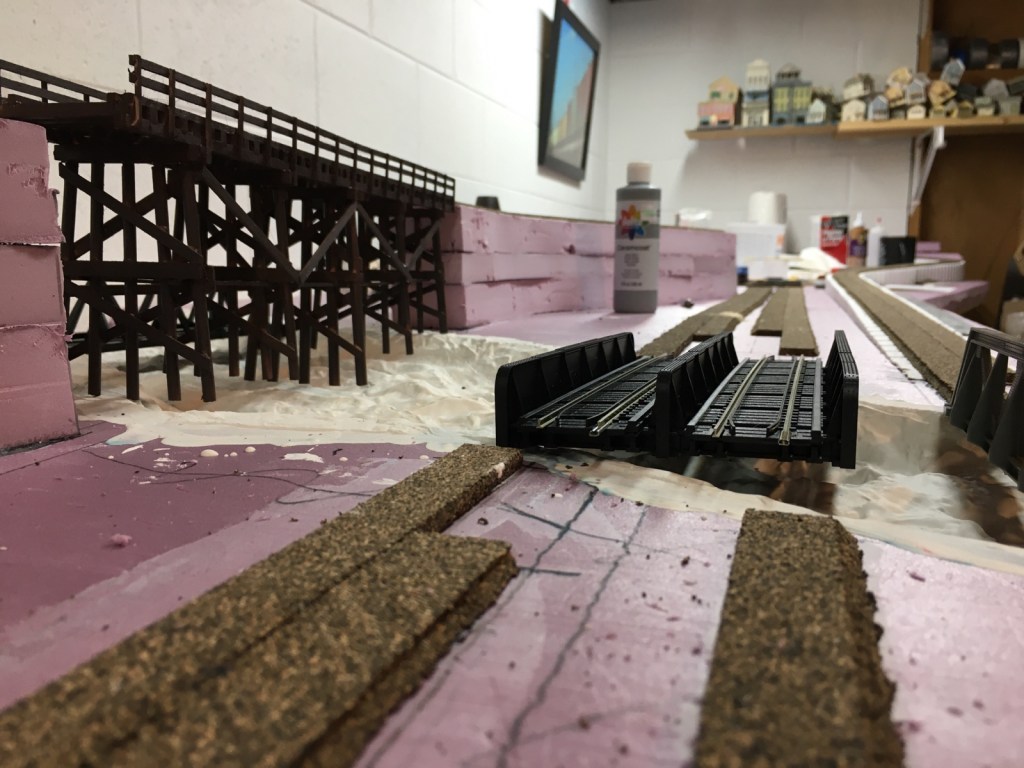 Cork roadbed comes in two halves. Once broken apart the beveled edges should be sanded.