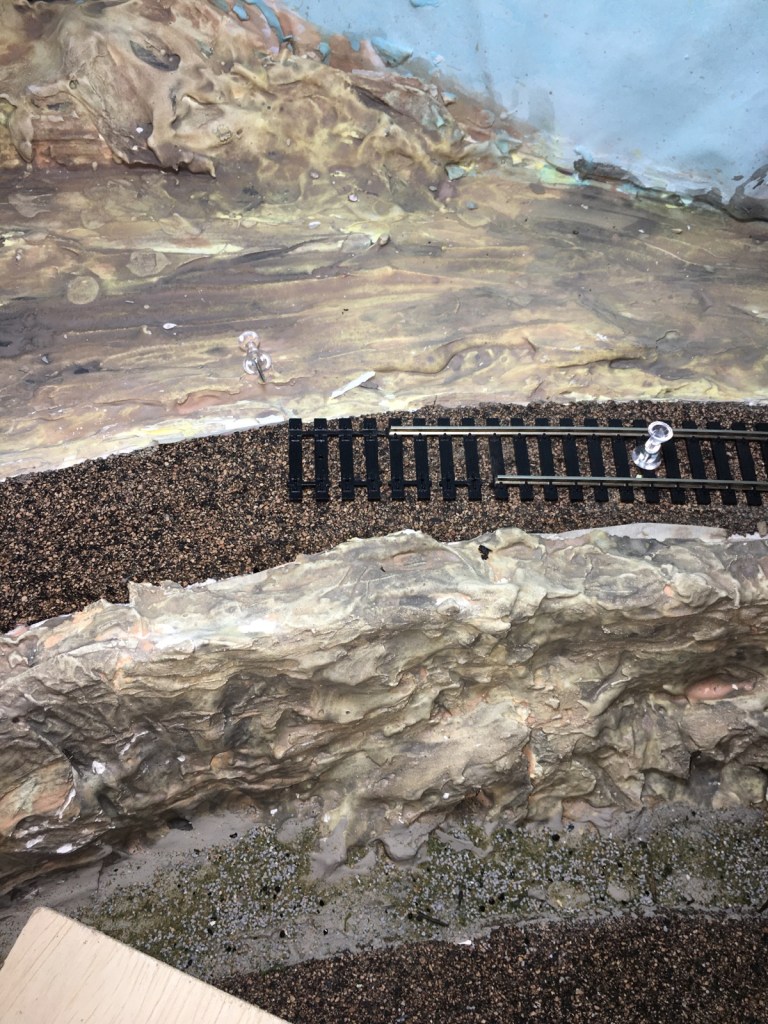 Tiles extending beyond rails.