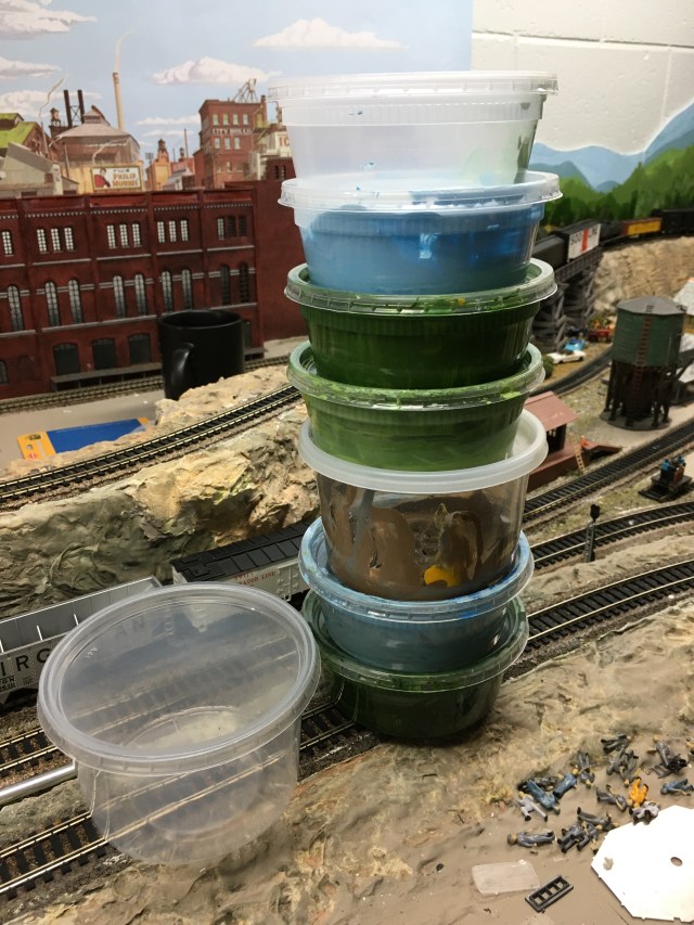 Paint tubs, train tracks, rocks, tools
