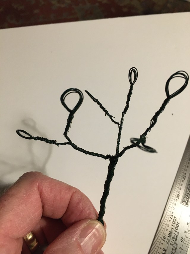 Six strands looped and twisted