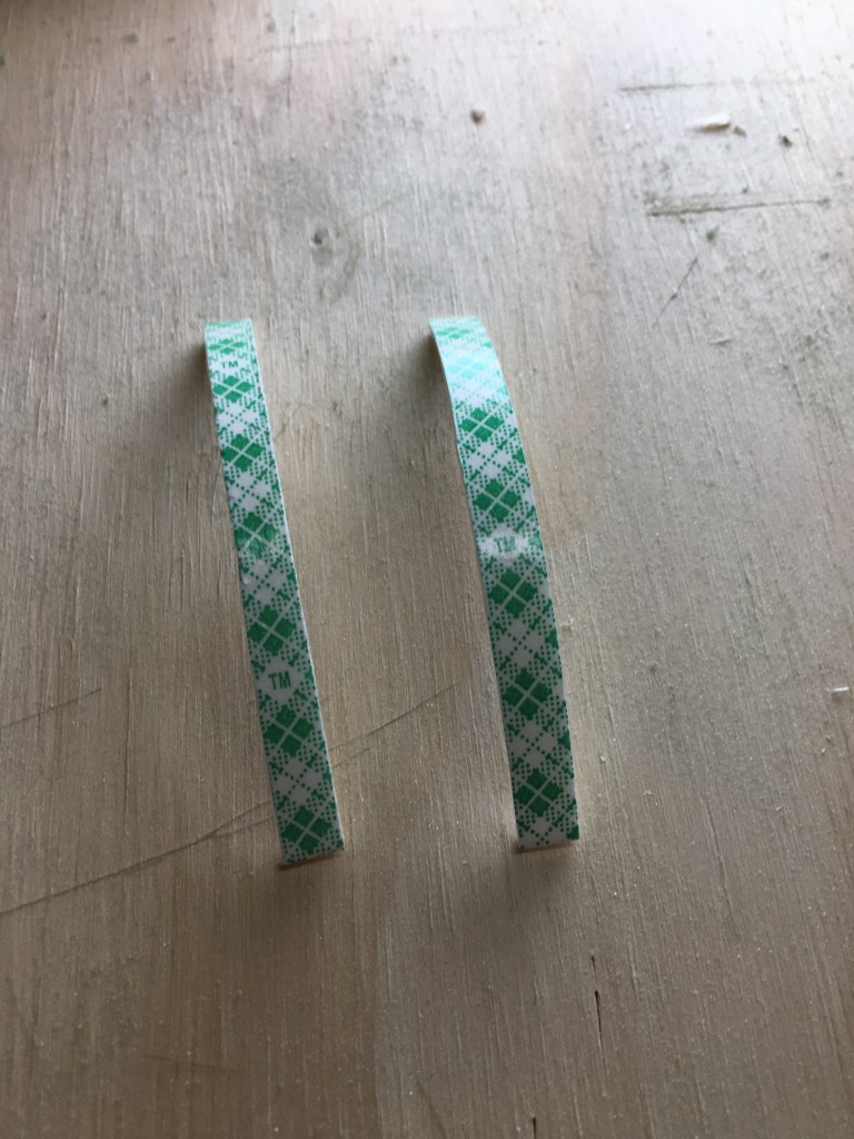 Foam tape cut in half