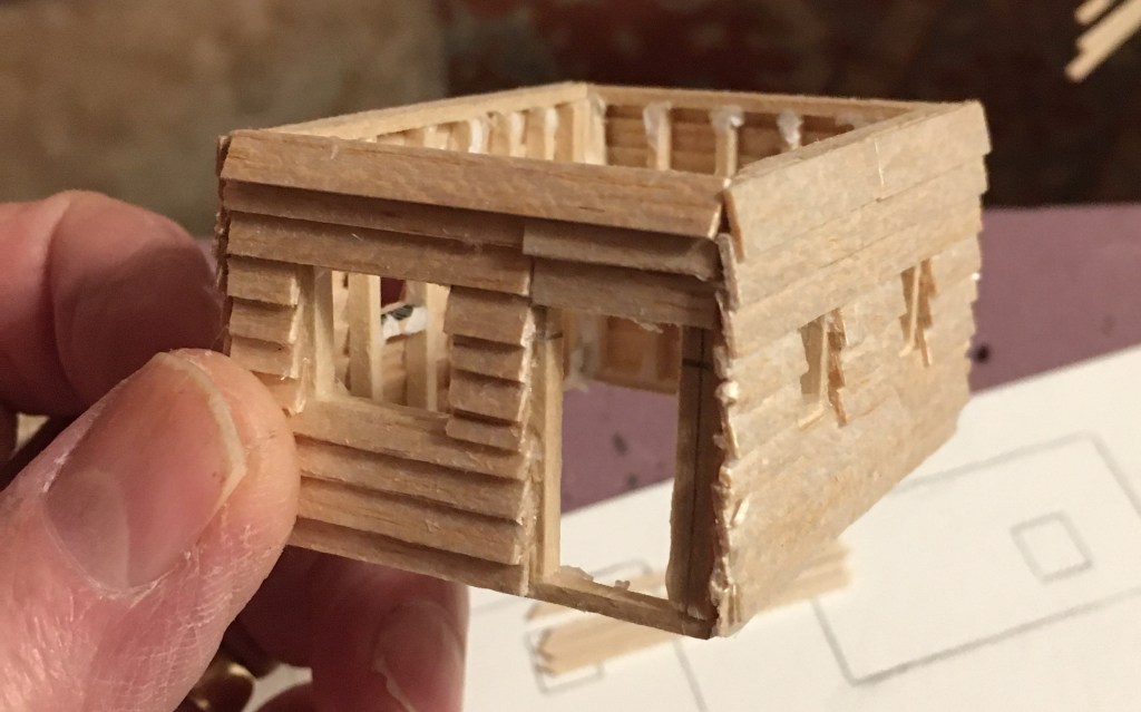 Balsa wood strips cut for cabin siding.