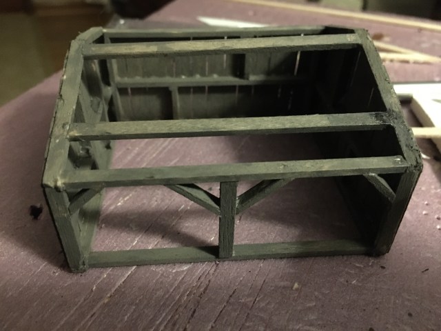 Sharp 1:87 scale workshop painted dull gray inside and out, ready for roofing.