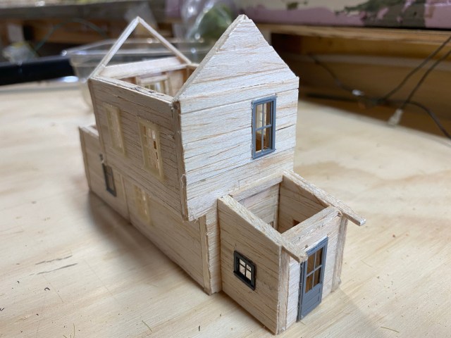 Balsa two story building without roof.