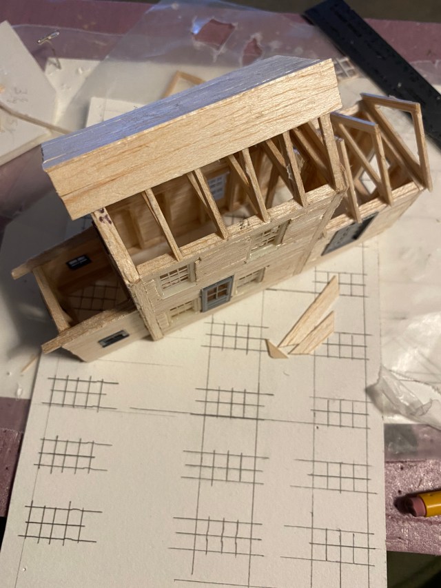 Balsa building with roof trusses and decking.