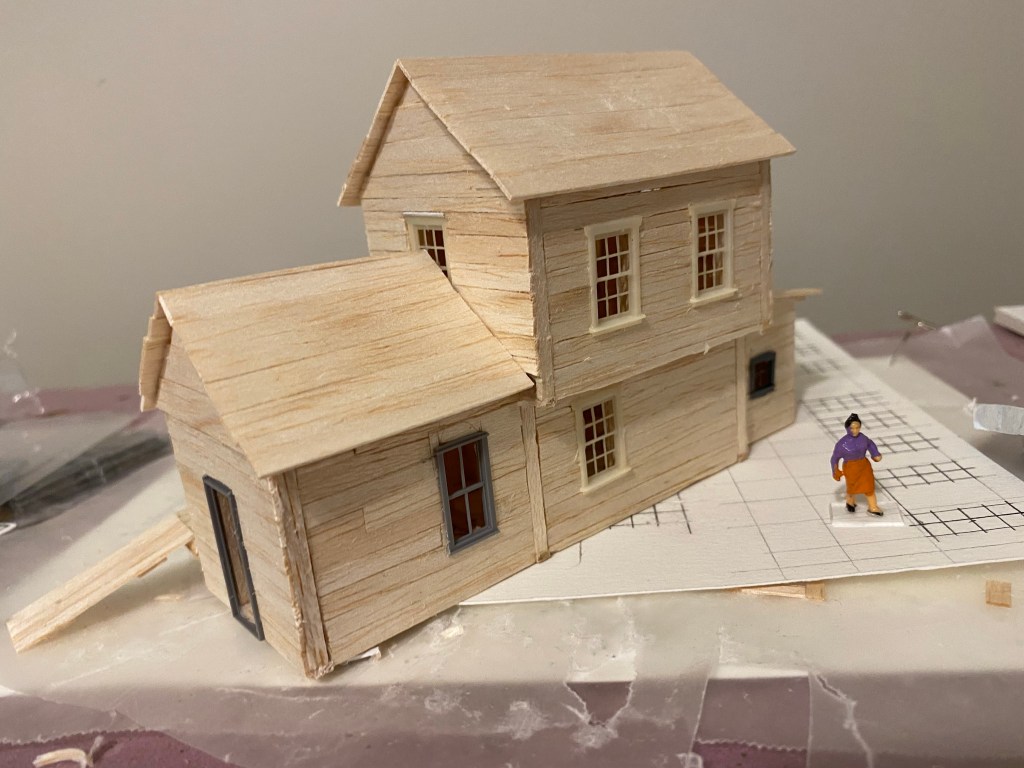 Completed rear view of two story structure.