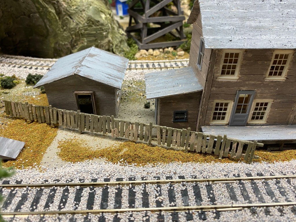 Section of balsa picket fence painted.