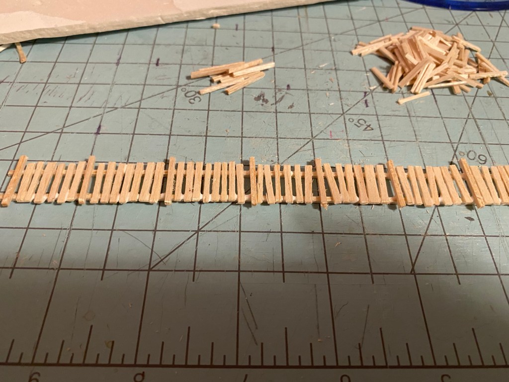 Picket fence finished ready to be painted.