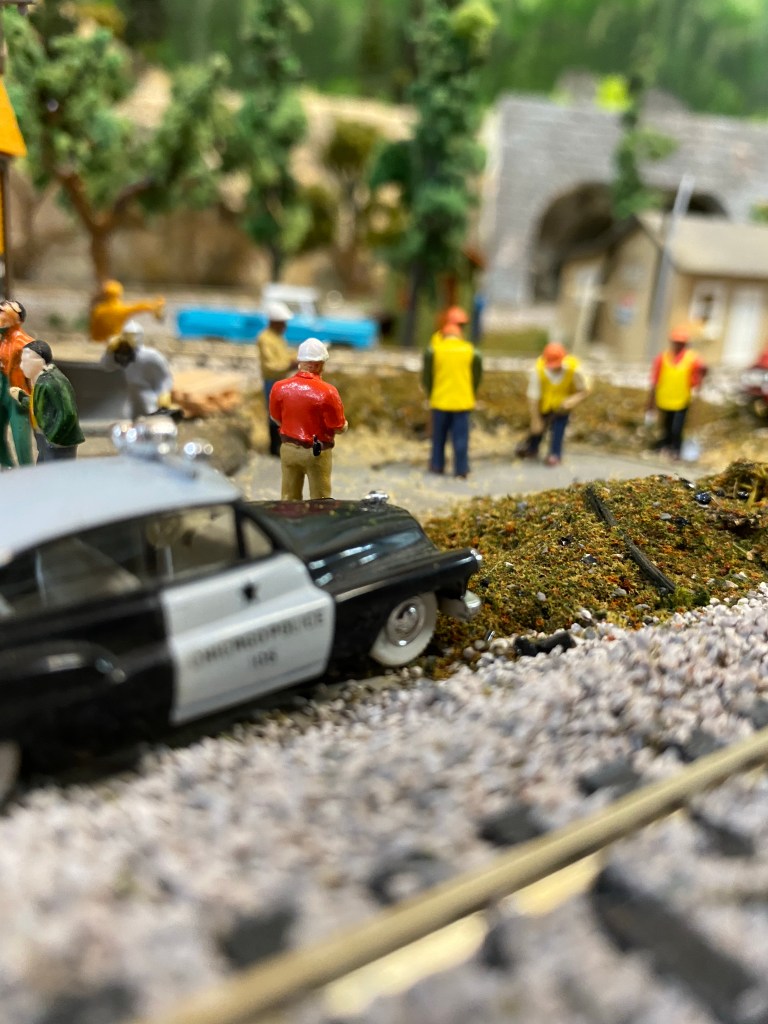 Sheriff Terkinberry leave police car to investigate the discovery of bones