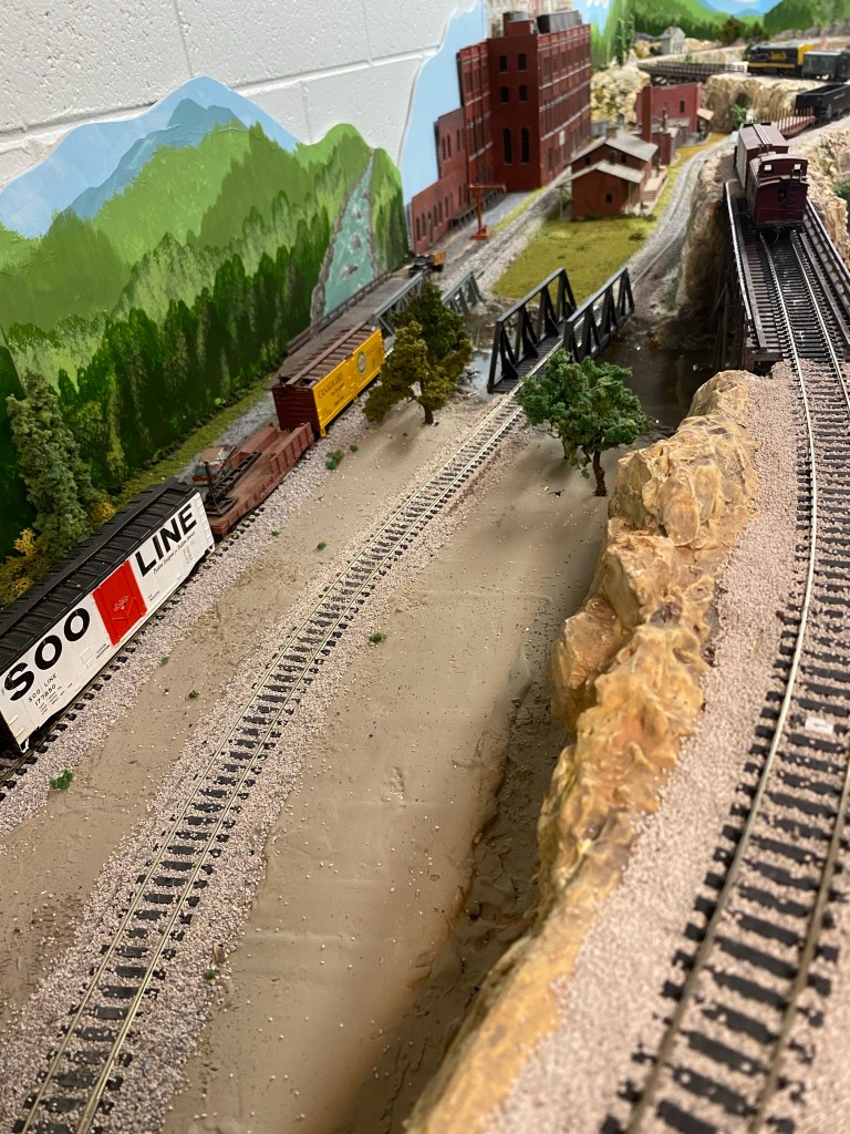 Three tracks, mountain ridge, bridges, Maple Valley River, hills