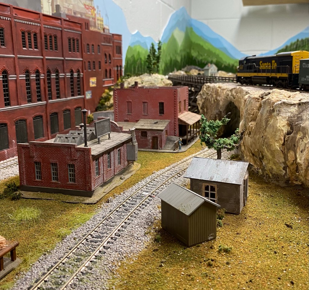 Hill, buildings, train, factory, bridge, track