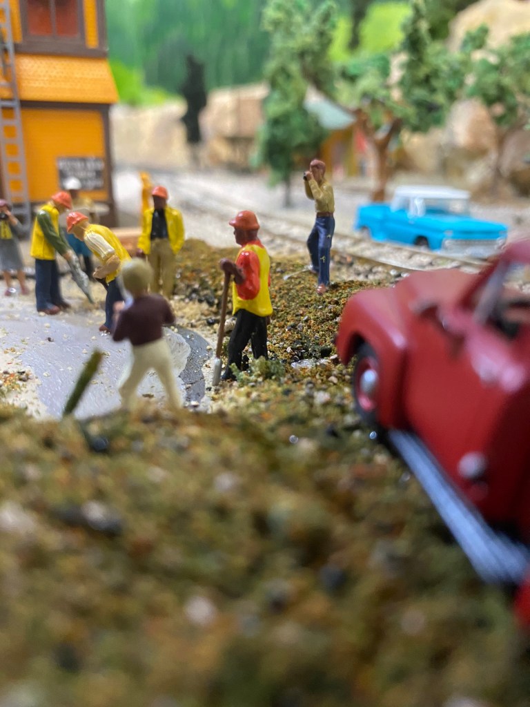 Red truck, people working,