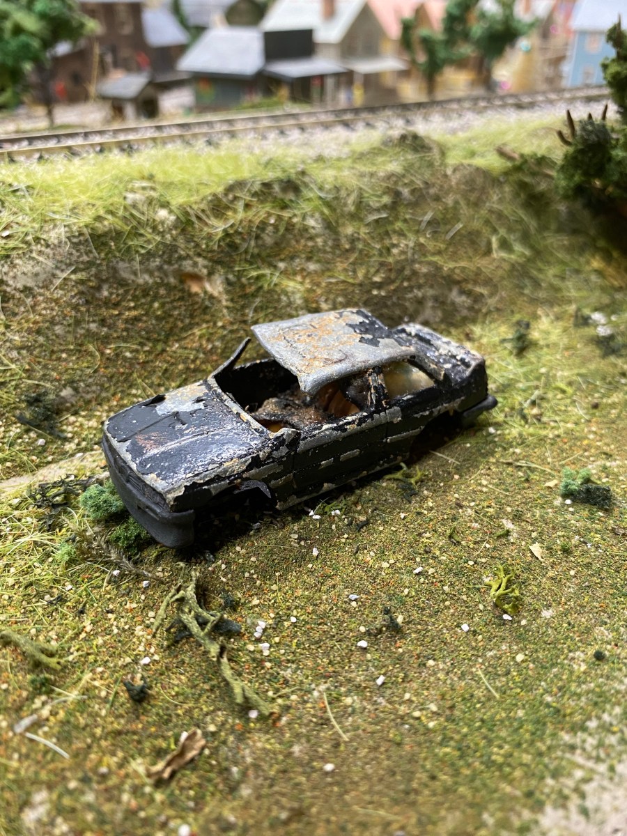 This small car inspired "Scandal at Maple Valley," it's sitting on the Maple Valley Short Line Model Railroad.