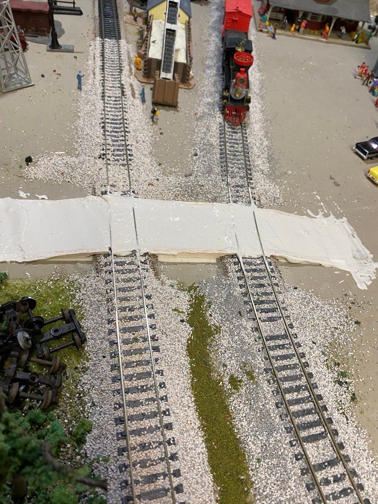 Balsa forms, wet plaster, two tracks.