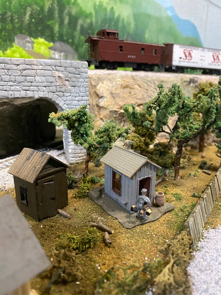 Layout scenery, two sheds, trees, fence, ground cover