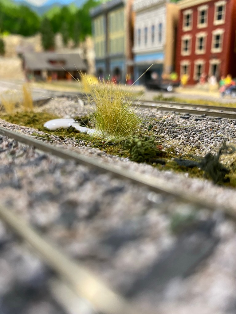 Planting of Woodland Scenics grass held in place by Static-Tac glue