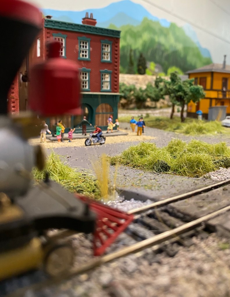 HO scale vintage steam engine, streets, grasses, buildings, people