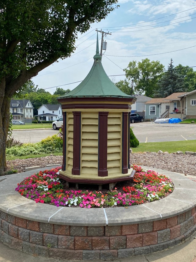 Cupola, decorative brick, flowers, houses