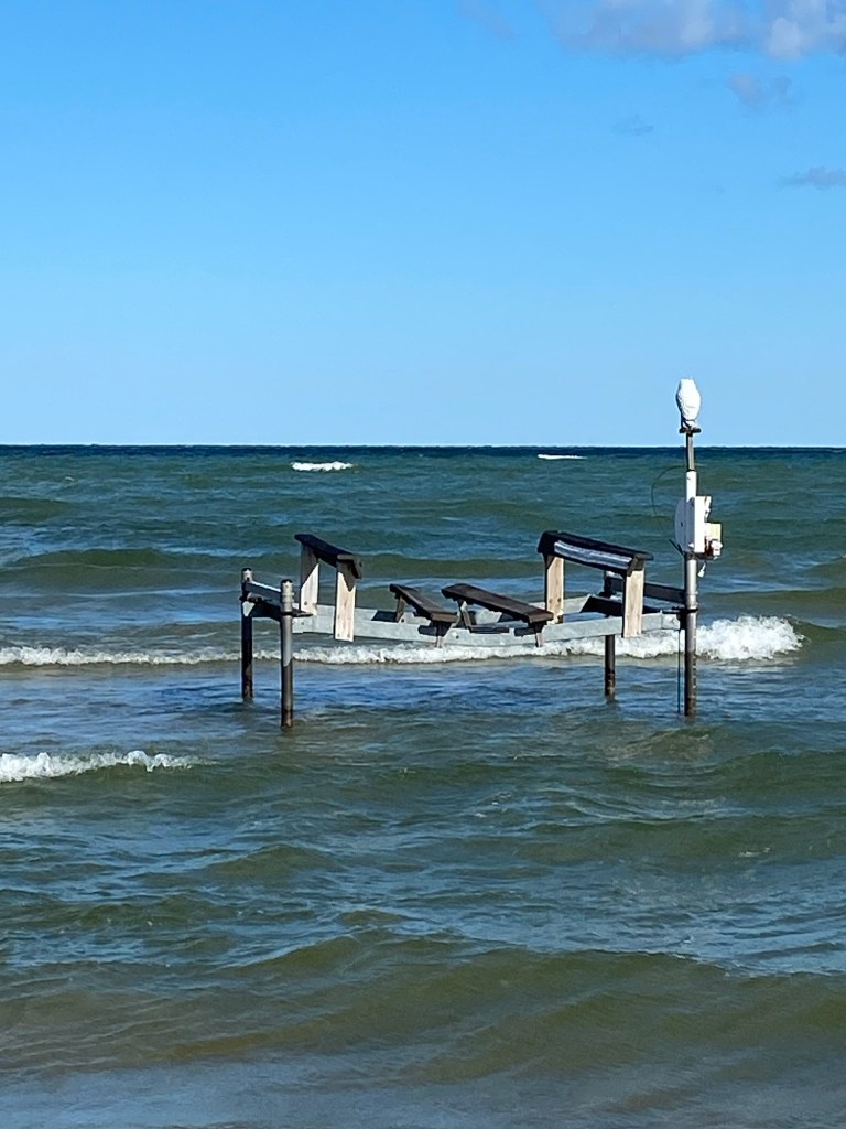 Waves, blue sky, boat hoist