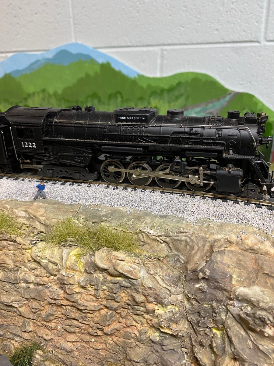 2-8-4 Steam engine, rocks, backdrop