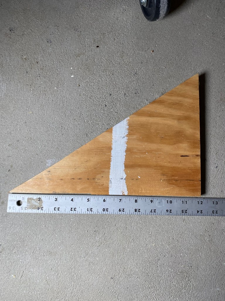 Plywood gusset, 13" back leg of the right triangle.