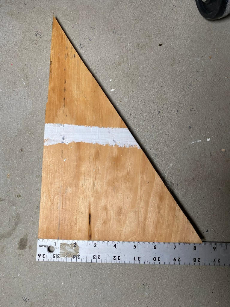 Plywood gusset with a right triangle with 8" base leg.